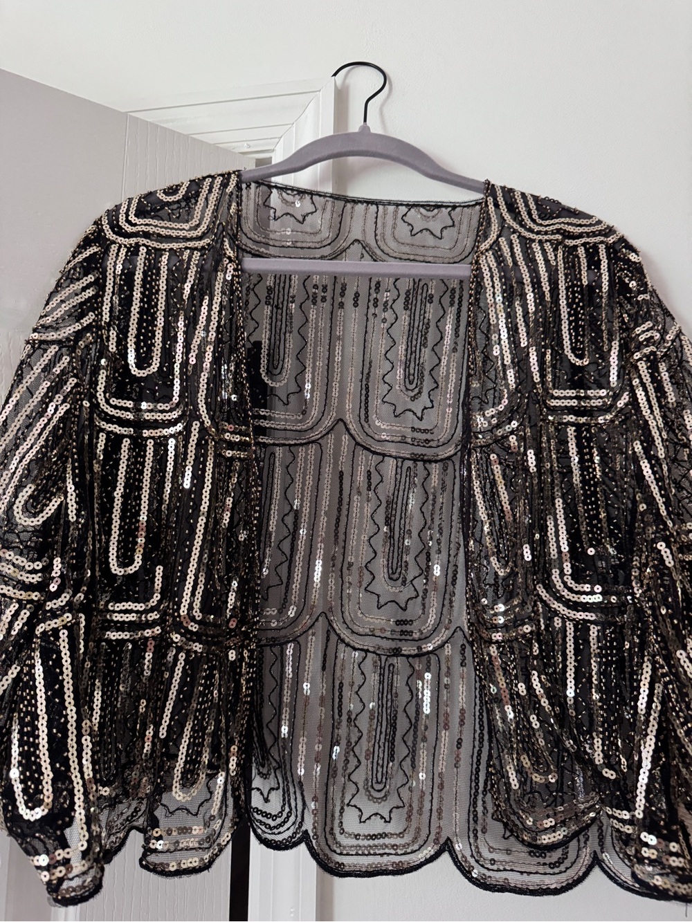 Black & Gold Sequined Mesh Short Sleeved Cardigan.